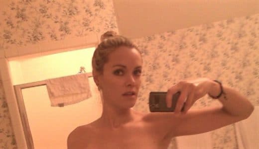 Kristanna Loken with a bun takes a mirror selfie