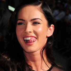 Megan Fox licking her teeth with her tongue