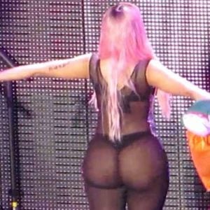 Nicki Minaj shows off her booty cheeks in see through outfit during show