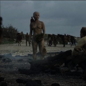 Emilia Clarke completely naked standing in ash