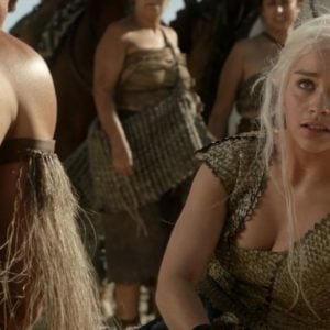 Emilia Clarke showing off cleavage hair messy