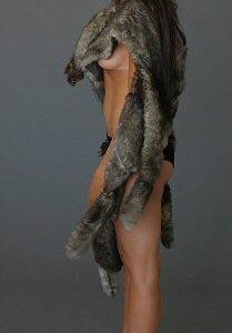 Gal Gadot wearing fur showing some under boob