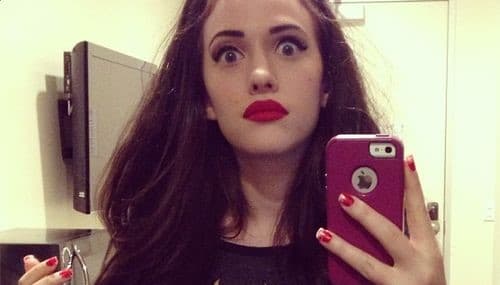 Kat Dennings with red lips selfie