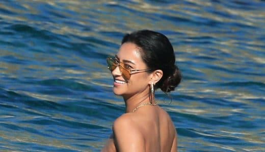 Shay Mitchell topless in Mykonos Greece in the ocean with sunglasses on